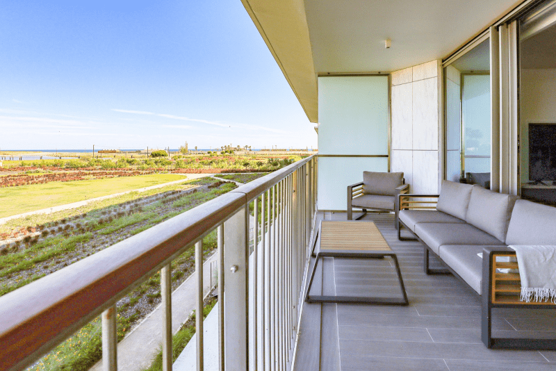 Cavala balcony at Bayline, Armação de Pêra: outdoor lounge set overlooking the gardens and open countryside