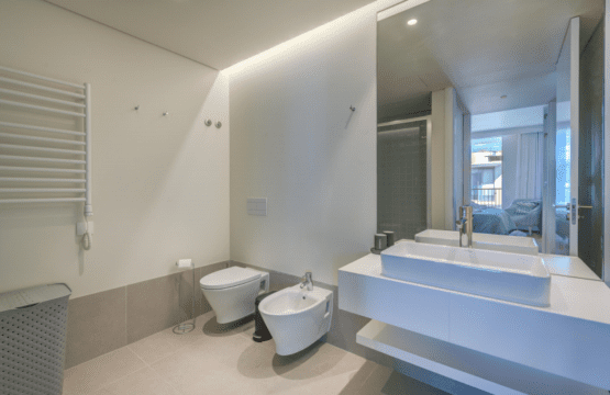 Liro bathroom at Bayline, Armação de Pêra: vessel basin, wall-hung toilet, bidet and heated towel rail