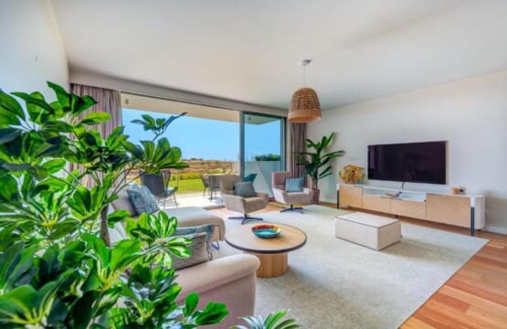 Pargo B living room at Bayline, Armação de Pêra: sofa, armchairs, TV and glass doors to the terrace